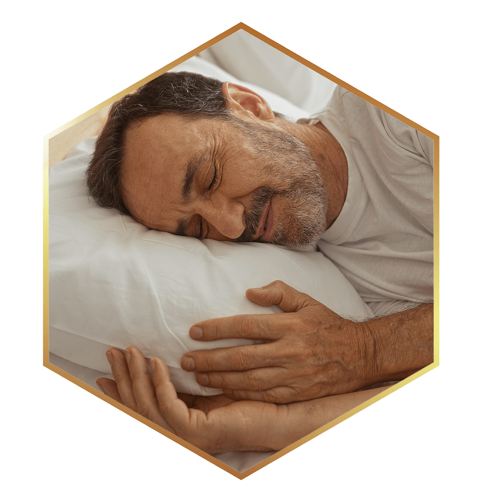 Elderly hispanic man peacefully sleeping in a comfortable bedroom