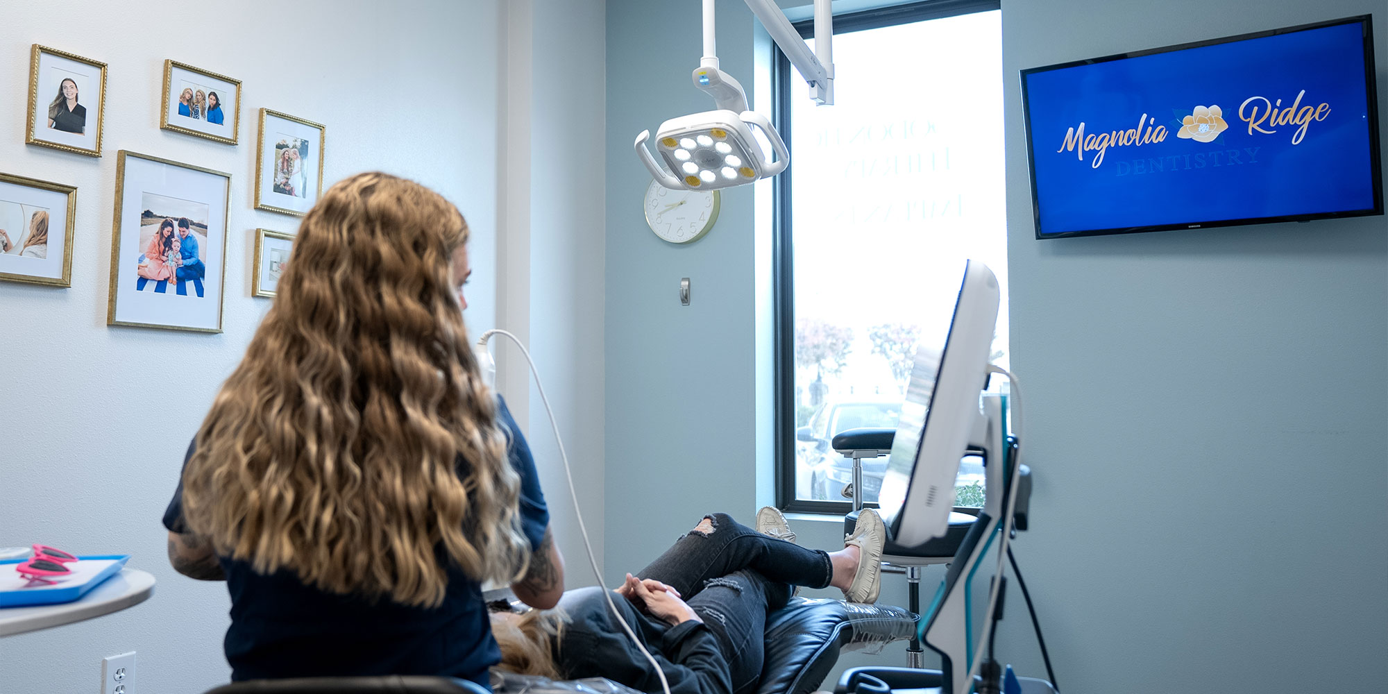 team member taking a 3d scan of patients mouth