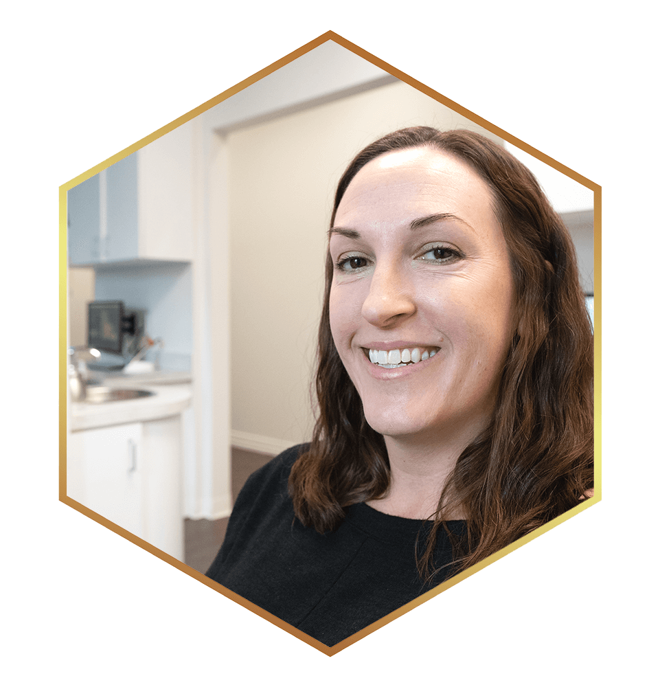 patient showing off new smile after teeth whitening
