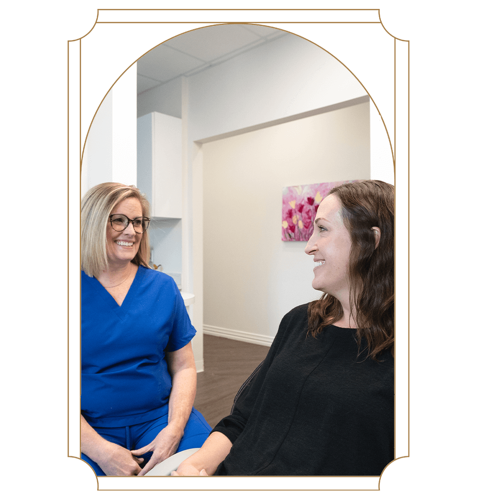 team member consulting with patient about Lingual Frenectomy